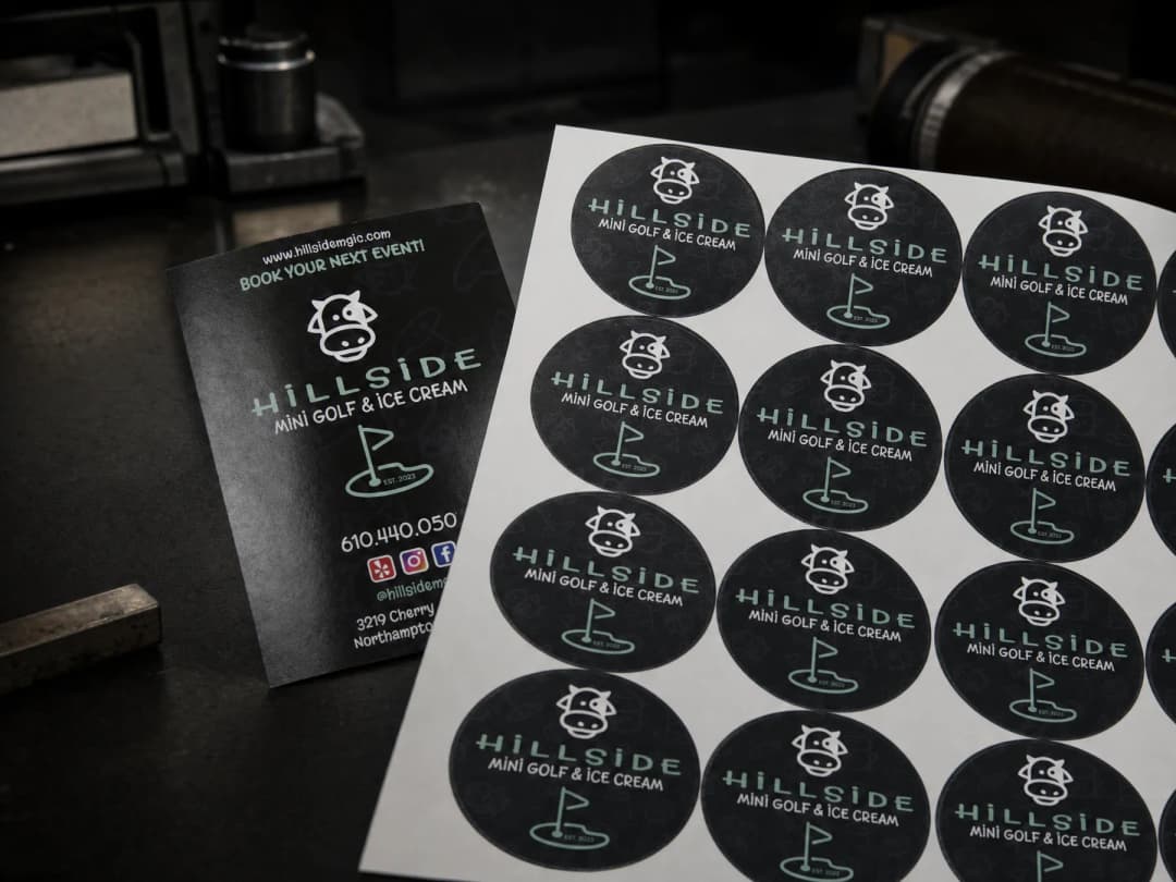 Hillside Mini Golf die-cut sticker sheets on the print bench